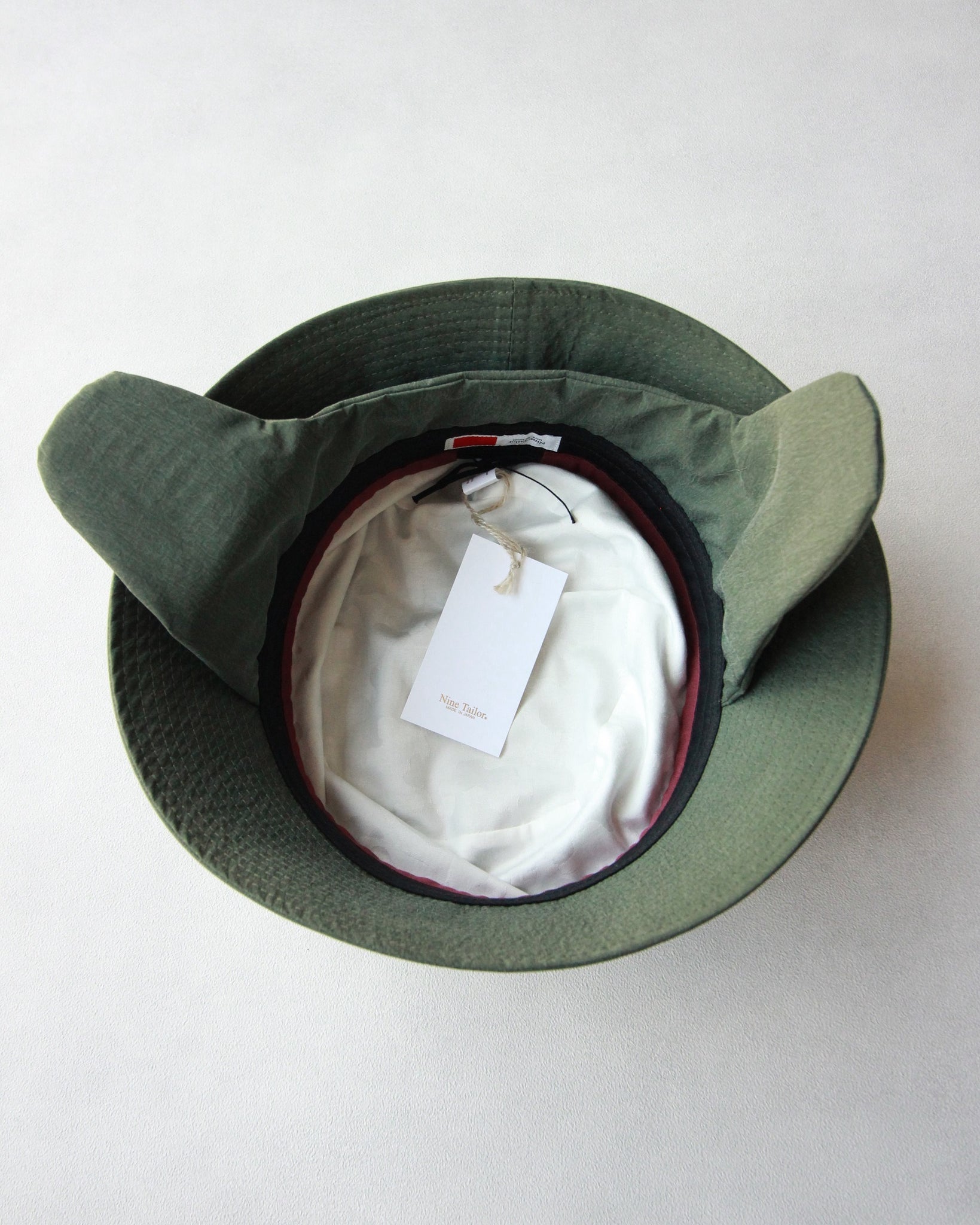 N-1113 / Elm Flap Hat – Nine Tailor